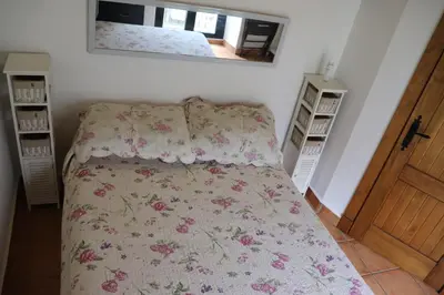 Cama o camas de una habitación en Apartamentos Las Buganvillas