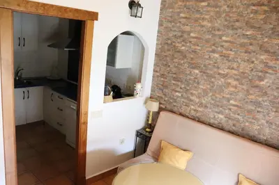 Cama o camas de una habitación en Apartamentos Las Buganvillas