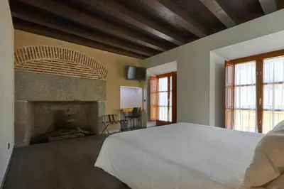 Cama o camas de una habitación en María Pacheco Hotel Boutique