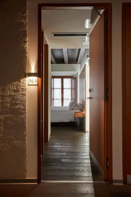 Cama o camas de una habitación en María Pacheco Hotel Boutique