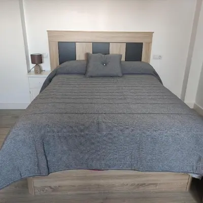 Cama o camas de una habitación en Apartamentos NayDa studio 6
