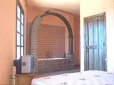 Cama o camas de una habitación en Casa Rural Las Gamellas