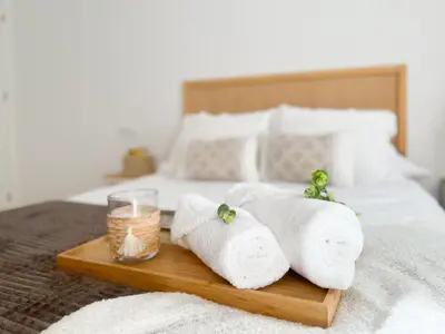 Cama o camas de una habitación en Apartamentos Turísticos Con Alma