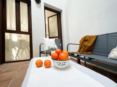 Cama o camas de una habitación en Apartamentos Turísticos Con Alma