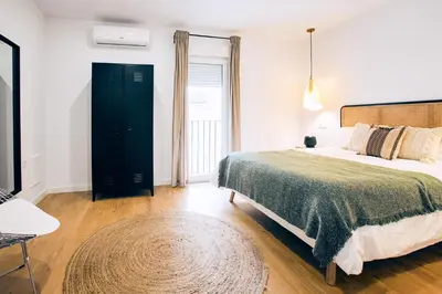 Cama o camas de una habitación en Apartamentos Durán Tirso de Molina