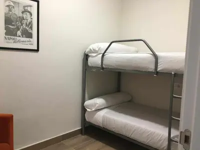 Cama o camas de una habitación en KubiK APARTAMENTOS K2