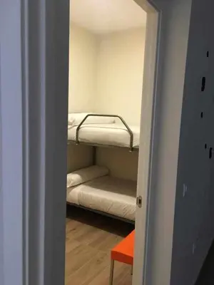 Cama o camas de una habitación en KubiK APARTAMENTOS K2