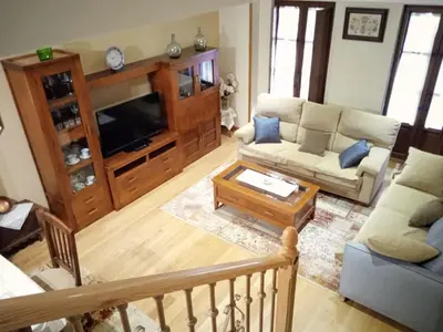 Una televisión o centro de entretenimiento en Casa Rural Buenavista