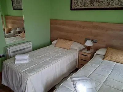Cama o camas de una habitación en Casa Rural Buenavista
