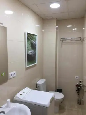 Un baño de KubiK APARTAMENTOS K3