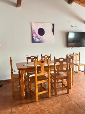 Una televisión o centro de entretenimiento en Casa Rural 