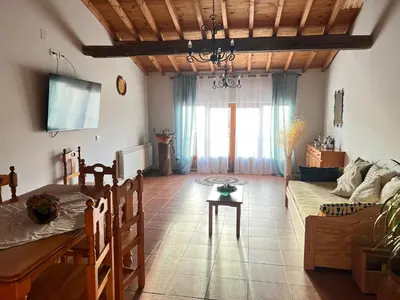 Una televisión o centro de entretenimiento en Casa Rural 