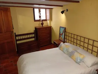 Cama o camas de una habitación en Casa Cofrades