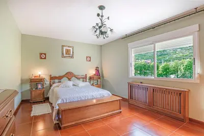 Cama o camas de una habitación en Casa Rural La Nava del Concejo