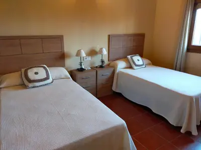 Cama o camas de una habitación en Complejo Rural La Paloma