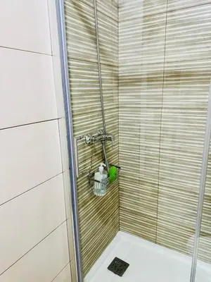 Un baño de ALAUDAE Apartamentos Parking Gratis