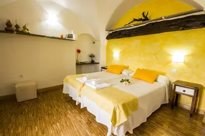 Cama o camas de una habitación en La Posada de Grimaldo