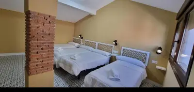 Cama o camas de una habitación en La Morada de Moret