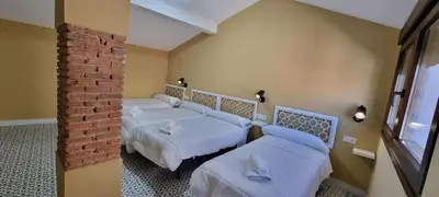 Cama o camas de una habitación en La Morada de Moret