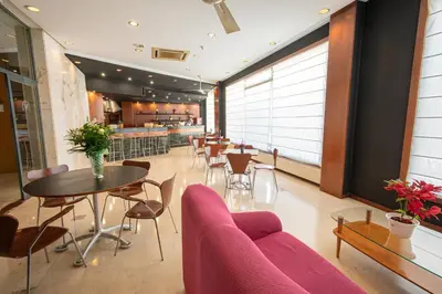Zona de estar de Hotel Bracamonte