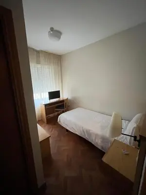 Cama o camas de una habitación en Hotel Bracamonte