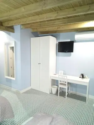 Una televisión o centro de entretenimiento en Casa Rural La Plata