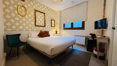 Cama o camas de una habitación en Santa Rita Rita B&Boutique