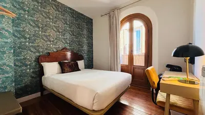 Cama o camas de una habitación en Santa Rita Rita B&Boutique