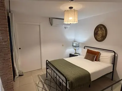 Cama o camas de una habitación en Santa Rita Rita B&Boutique