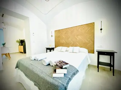 Cama o camas de una habitación en Apartamentos Guaditania