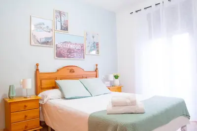 Cama o camas de una habitación en Cáceres de Cine