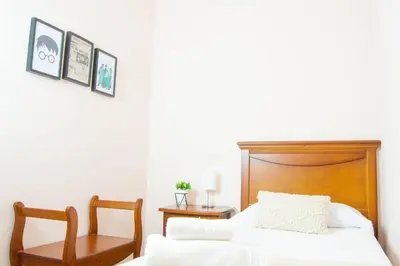 Cama o camas de una habitación en Cáceres de Cine