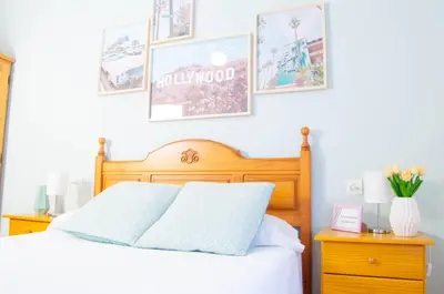 Cama o camas de una habitación en Cáceres de Cine