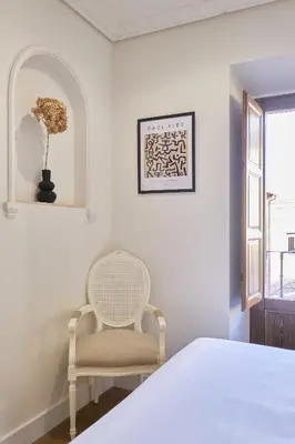 Cama o camas de una habitación en Estudios Bordadores by Valdesierra