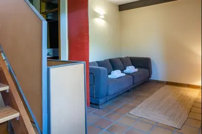 Zona de estar de Casa Rural La Vera, Terraza con Barbacoa y Vistas a la Sierra