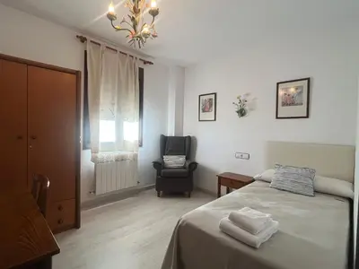 Cama o camas de una habitación en El Palaero