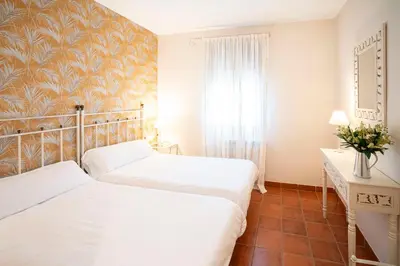 Cama o camas de una habitación en Casa Rural La Sierra de Monfragüe