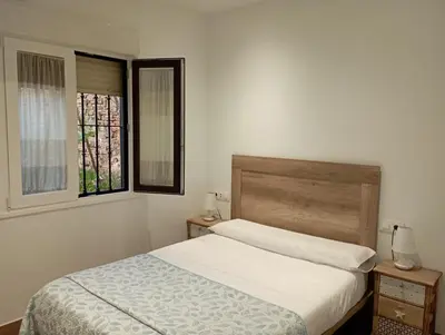 Cama o camas de una habitación en Alojamientos Ribera del Tajo
