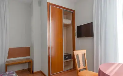 Una televisión o centro de entretenimiento en Ele Mirador de Santa Ana