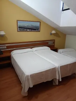 Cama o camas de una habitación en Ele Mirador de Santa Ana