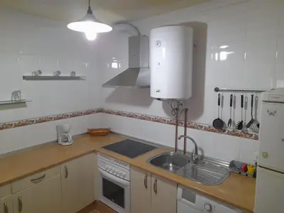 Una cocina o zona de cocina en Alojamiento Castelar