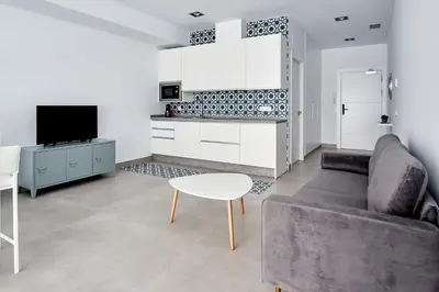 Una cocina o zona de cocina en 9 NIDOS Céntrica Suites - Nuevo