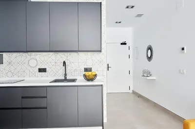 Una cocina o zona de cocina en 9 NIDOS Céntrica Suites - Nuevo