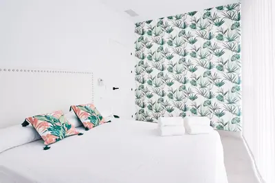 Cama o camas de una habitación en 9 NIDOS Céntrica Suites - Nuevo