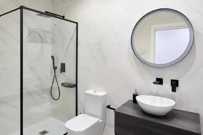 Un baño de 9 NIDOS Céntrica Suites - Nuevo