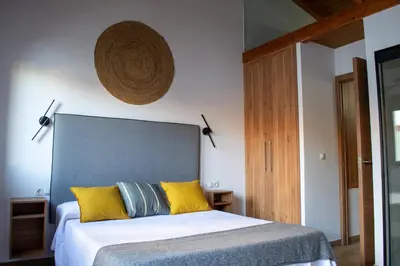 Cama o camas de una habitación en Casa Rural Doña Sol