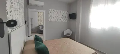 Una televisión o centro de entretenimiento en Apartamentos Las trece llaves