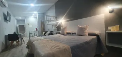 Cama o camas de una habitación en Apartamentos Las trece llaves