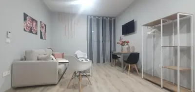 Una televisión o centro de entretenimiento en Apartamentos Las trece llaves