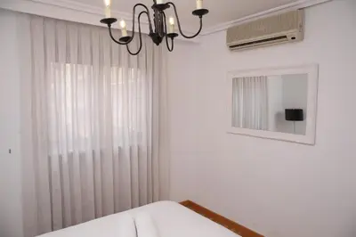 Cama o camas de una habitación en SAN JUSTO 6 by Salamancavacacional
